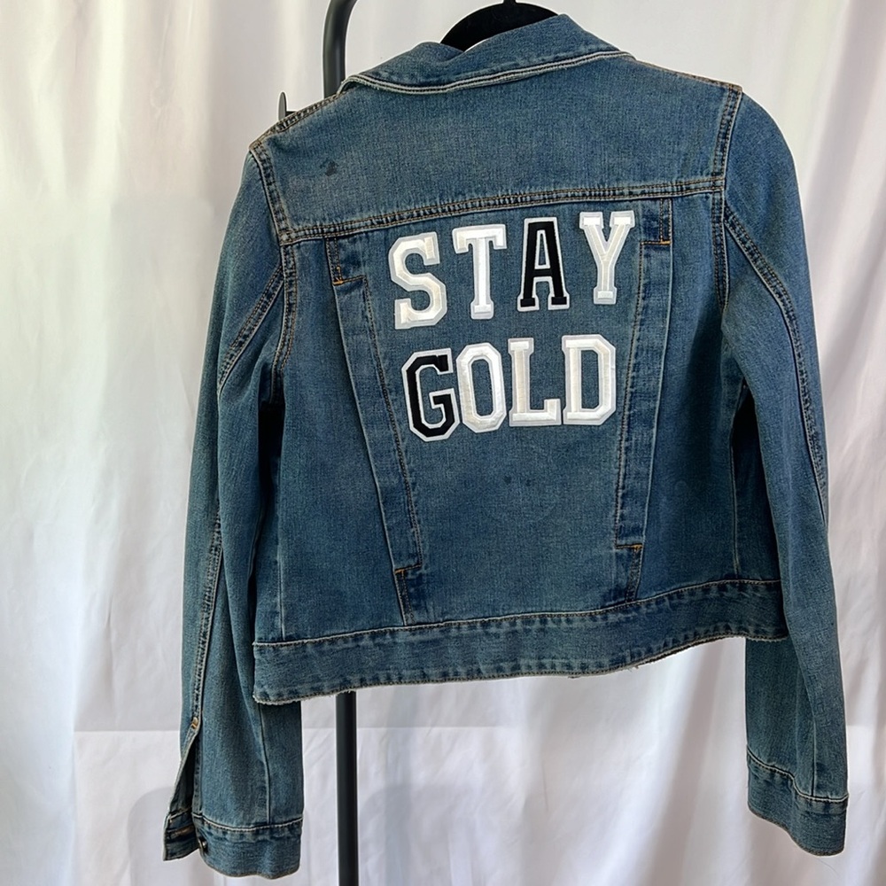 Free people denim jacket with patches size small
